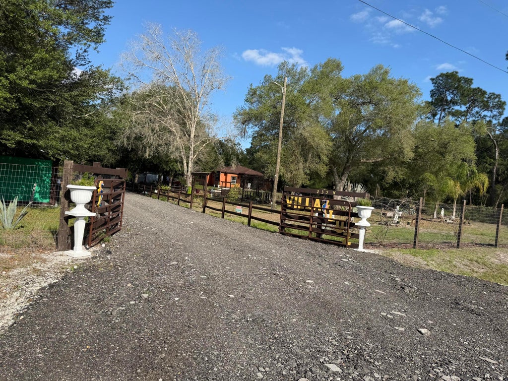 Photo of 235 N Sendero Street, Clewiston, FL 33440 (MLS # B26017409)