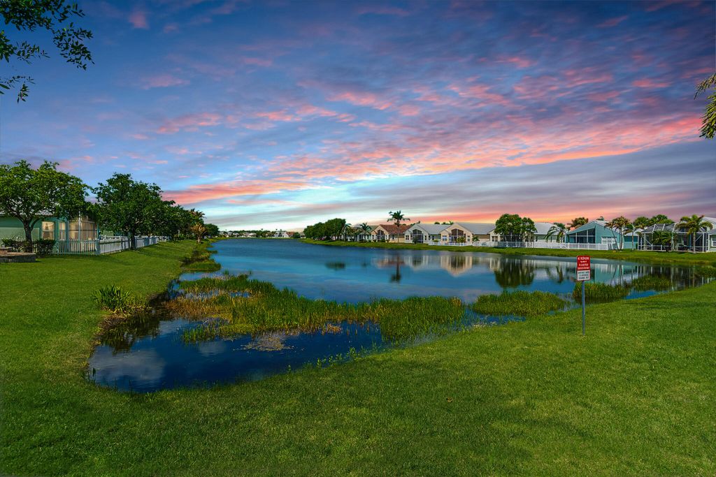 Photo of 163 NW Pleasant Grove Way, Port Saint Lucie, FL 34986 (MLS # B26015745)