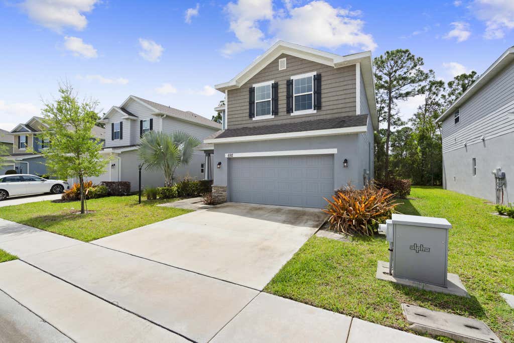 Photo of 692 NE Turtleback Trail, Port Saint Lucie, FL 34983 (MLS # B26055104)