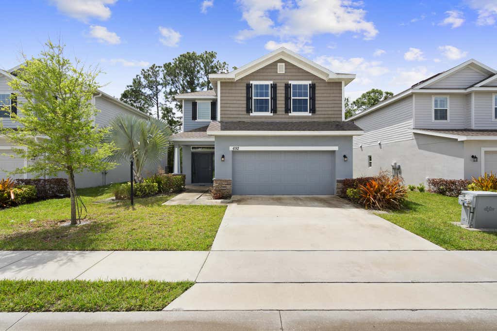 Photo of 692 NE Turtleback Trail, Port Saint Lucie, FL 34983 (MLS # B26055104)