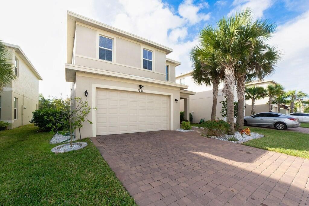 Photo of 1621 NW Cataluna Circle, Port Saint Lucie, FL 34986 (MLS # R11132574)