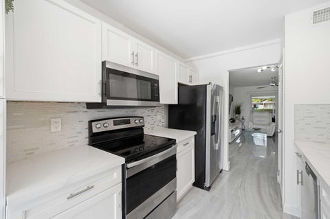 Tiny photo for 10875 NW 29th Manor #8, Sunrise, FL 33322 (MLS # B26012840)