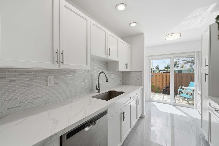 Stunning Waterfront Townhome | 2 Bed / 2.5 Bath Beautifully renovated top to bottom, this two-story townhome in Sunrise's Country Squire community is truly move-in ready. Featuring both a front and back patio, there's no shortage of space to entertain or unwind. The large screened-in back patio offers direct water views a serene backdrop you'll never tire of. Spacious bedrooms, 2 full baths,& a 1/2 bath.Roof 2024, A/C 2019, impact glass. Washer/Dryer 2022. Community amenities include a pool, tennis courts, and clubhouse, plus two assigned parking spaces. Just a short drive to Fort Lauderdale beaches and only 15 minutes from Fort Lauderdale/Hollywood International Airport, ideal for beach lovers and frequent travelers alike. Opportunities like this don't last, schedule your showing today.