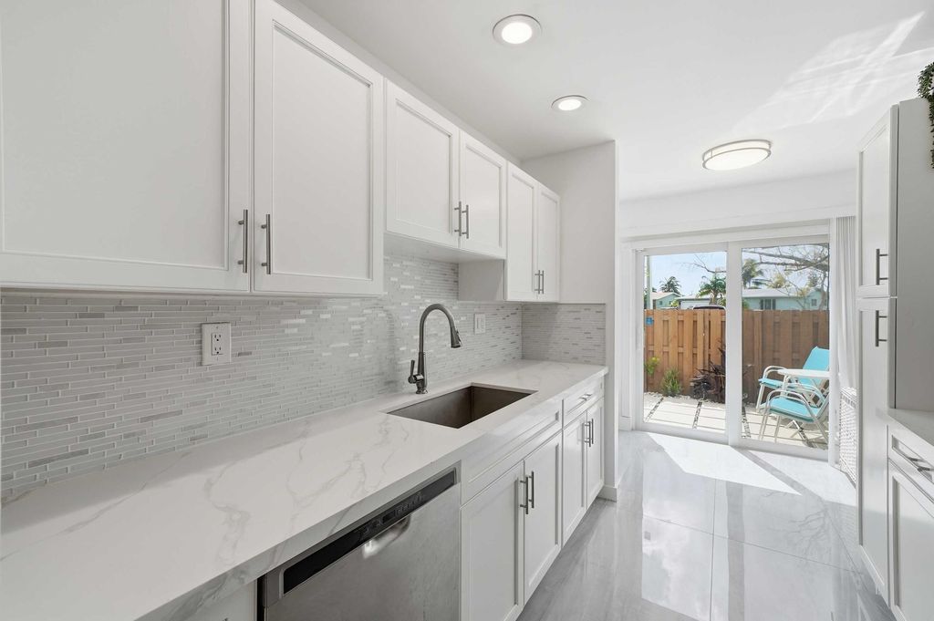 Photo of 10875 NW 29th Manor #8, Sunrise, FL 33322 (MLS # B26012840)