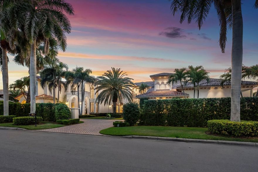 This double-lot golf course home in the prestigious Royal Palm Yacht & Country Club, boasts 207 feet of golf frontage, offering stunning views overlooking three Jack Nicklaus fairways!Step into paradise as you enter the expansive outdoor oasis featuring a heated, two-tier, child-friendly pool with a spa and playful water sprays. Entertain guests or unwind in style on the covered terrace, where a natural gas fireplace adds warmth and ambiance to cool evenings under the stars.The interior of this magnificent home is equally impressive, with first and second-floor master suites offering serene pool views and luxurious accommodations. The gourmet open-air kitchen is a chef's dream, featuring custom cabinetry, integrated appliances, and a huge walk-in pantry, perfect for culinary creation