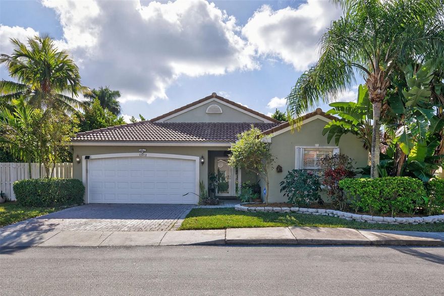 HURRY TO SEE THIS GREAT HOME IN SAWGRASS/SAVANNAH! OPEN PLAN, HIGH CEILINGS, WARM WOOD FLOORS, WELL EQUIPPED KITCHEN, SS FRIDGE/STOVE 2022, HUGE GRANITE ISLAND+PANTRY. SPLIT PLAN! AMPLE MAIN SUITE, LGE WALK-IN. OUTDOOR PARADISE, OVERSIZED PRIVACY FENCED YARD, FLOWERING TREES & PRODUCTIVE MANGO! INSULATED ROOFED SCREENED PATIO IS A COOL SPACE TO RELAX, ENTERTAIN, DINE. TURN-KEY..2015 TILE ROOF, IMPACT DOORS, IMPACT/ACCORDION WINDOWS, NEW HURRICANE GAR. DOOR, NEW HOT WTR HTR, NEW ELEC PANEL + SURGE PROTECTION. FRONT LAWN CARE+FENCE REPAIR/REPLACEMENT INCLUDED! WALK TO SAWGRASS ELEM OR BUS IN FRONT OF COMMUNITY. PERFECTLY SITUATED! ENJOY WORLD CLASS SHOPPING, DINING, HOUSES OF WORSHIP, HIGHWAYS, EVERGLADES, BEACHES, AIRPORTS, HOSPITALS! BEST OF FLORIDA LIVING IN A WELCOMING, FRIENDLY ENCLAVE!