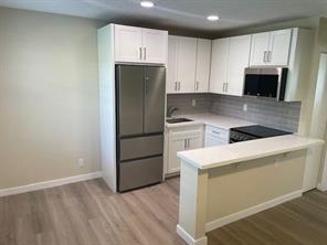 Beautifully and totally renovated. New impact windows. Second floor unit, new ceiling fans and recessed lighting in kitchen, new flooring, baseboards, cabinets, stainless steel appliances and countertops .Bathroom has brand new shower renovation, vanity, and toilet. Upgraded plumbing. Low HOA includes water, pool, tennis courts and pavilion, laundry on site. PET FRIENDLY. OK TO LEASE IST YEAR. No age restrictions…complex is being painted. No assessment. HOA has reserves, no special assessments planned, excellent tenant in place to December 2025