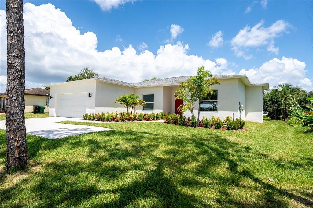 Photo of 143 SW Thornhill Drive, Port Saint Lucie, FL 34984 (MLS # R11054615)
