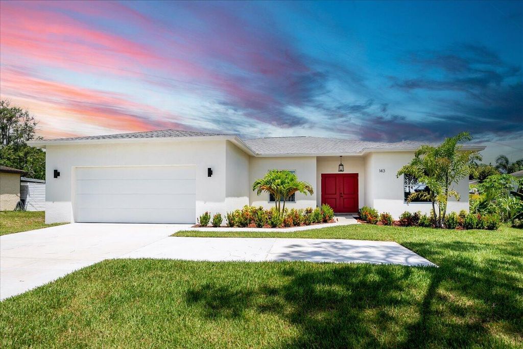 Photo of 143 SW Thornhill Drive, Port Saint Lucie, FL 34984 (MLS # R11054615)