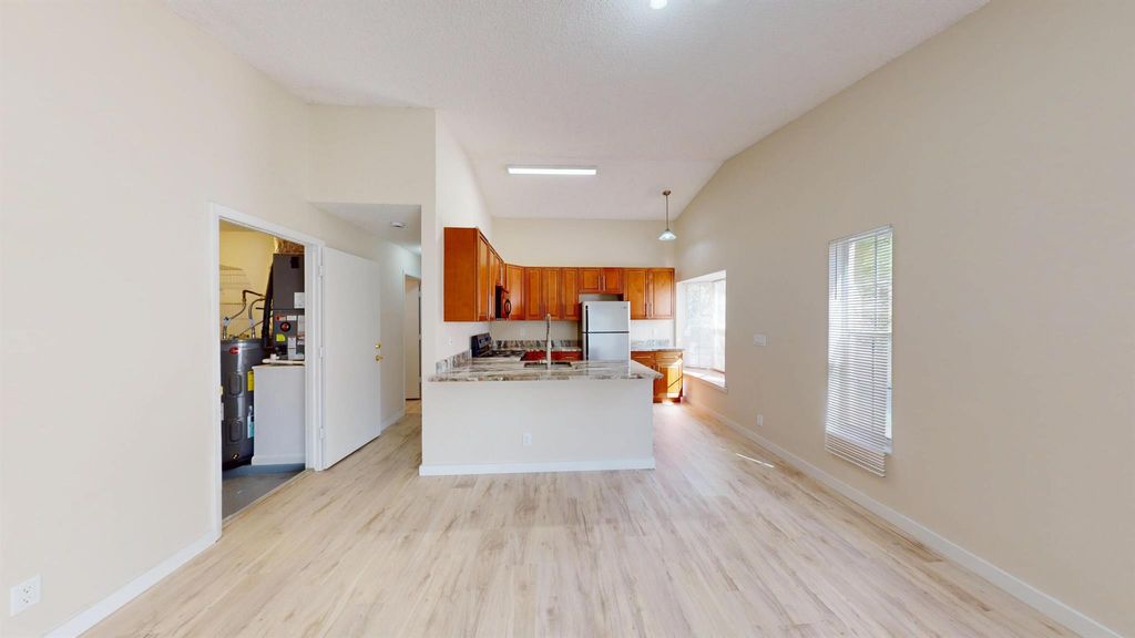 Photo of 5401 Pinnacle Lane, West Palm Beach, FL 33415 (MLS # R11095159)