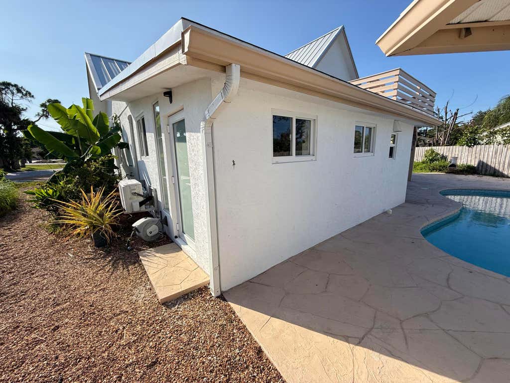 Photo of 5814 SE ORANGE BLOSSOM Trail S #B, Hobe Sound, FL 33455 (MLS # B26068908)