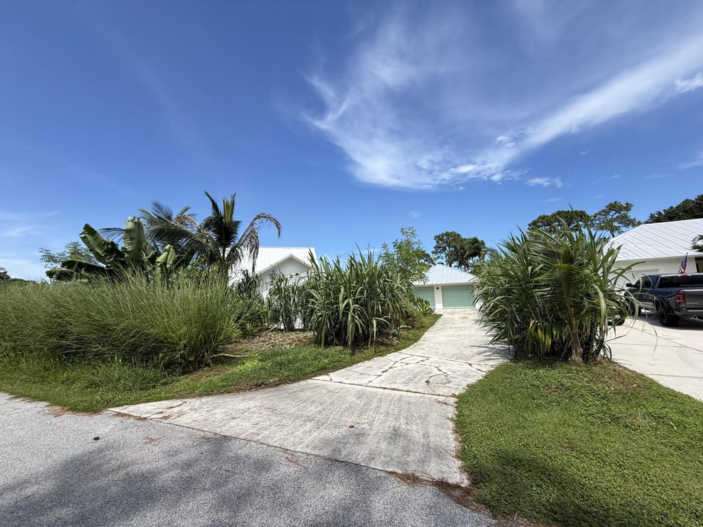 Photo of 5814 SE ORANGE BLOSSOM Trail S #B, Hobe Sound, FL 33455 (MLS # B26068908)