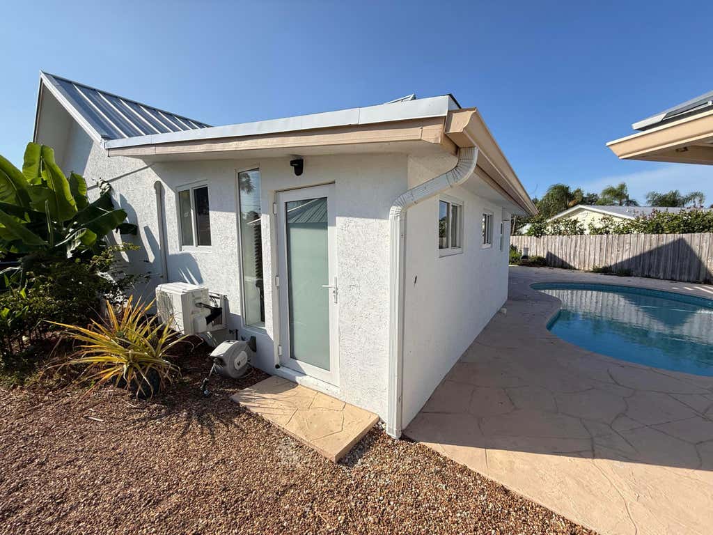 Photo of 5814 SE ORANGE BLOSSOM Trail S #B, Hobe Sound, FL 33455 (MLS # B26068908)
