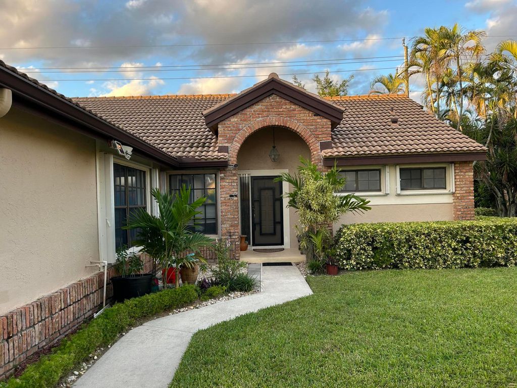 Photo of 7207 Le Chalet Boulevard, Boynton Beach, FL 33472 (MLS # B26007619)