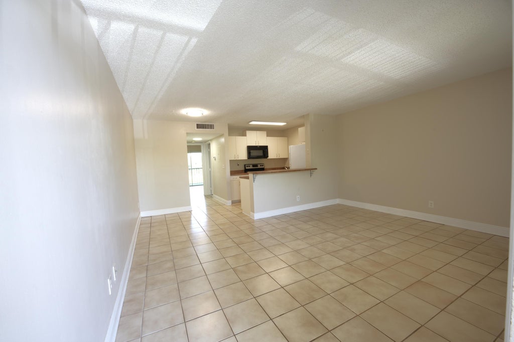 Photo of 1523 Meadows Circle W, Boynton Beach, FL 33436 (MLS # B26044126)