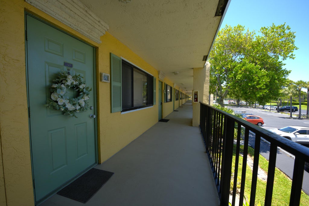 Photo of 1523 Meadows Circle W, Boynton Beach, FL 33436 (MLS # B26044126)