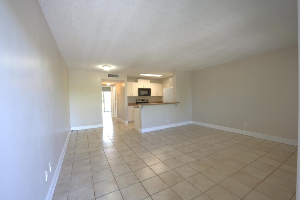 Photo of 1523 Meadows Circle W, Boynton Beach, FL 33436 (MLS # B26044126)