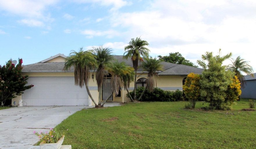 Freshly Updated Pool Home in East Port St. Lucie! Fresh paint, brand-new carpet, and a bright kitchen with skylight! Enjoy a split-bedroom layout with spacious bedrooms and a private fenced backyard and sparkling pool--with pool service included. Inside laundry with washer & dryer. Close to shopping, dining, and the beach--this one has it all!