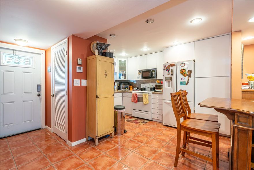 Phase III MAGNIFICENT TRANQUIL WATER, GOLF AND LANDSCAPE VIEWS. CLUBHOUSE ACROSS THE STREET; 2BR/2BA BRIGHT CORNER UNIT; WASHER/DRYER INSIDE!  UPDATED OPEN KITCHEN & Bathrooms (2 like new Showers). IMPACT GLASS ENCLOSED PATIO! Conveniently Close to entrance. Beautiful Mexican style flooring throughout. 2nd bedroom currently used as music studio; Recreation Lease PAID IN FULL! FREE golf (except cart fees) on two 18 hole courses (PGA & Par3); Amenities include Restaurant, Billiard Room, Bbq/Picnic Area, Clubhouse, Courtesy Bus, Exercise Room, Heated Pool, Library, Putting Green, Sauna, Shuffleboard, Tennis, Pickle Ball, Vehicle Wash Area, Electric Car Charging Station. Close to shopping, dining & highways. 15 min. to the beach. Association says 55+ age required; LOCATION! LOCATION! LOCATION!
