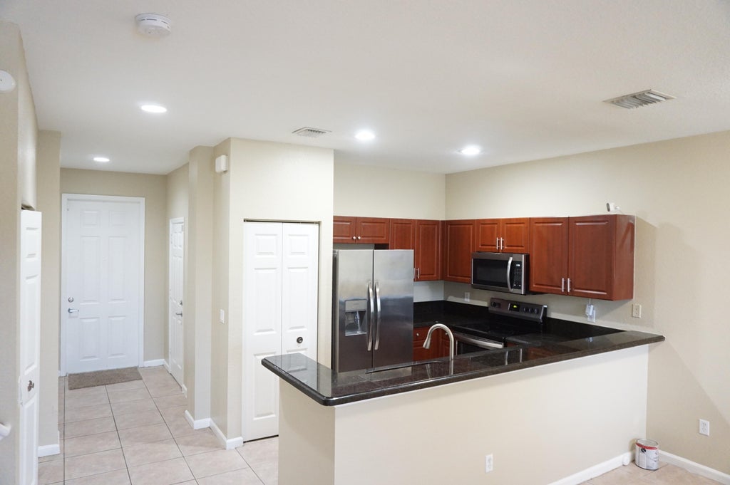 Photo of 2026 Nassau Drive, Riviera Beach, FL 33404 (MLS # B26066095)