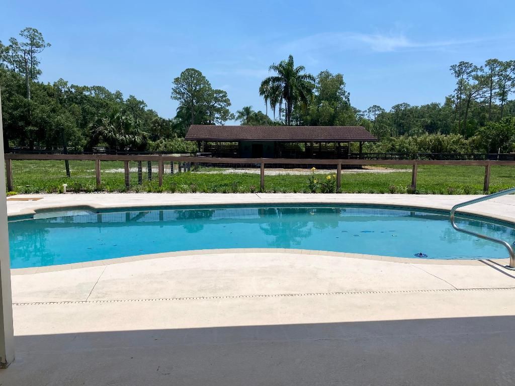 Photo of 16605 115th Avenue N, Jupiter, FL 33478 (MLS # R10962800)