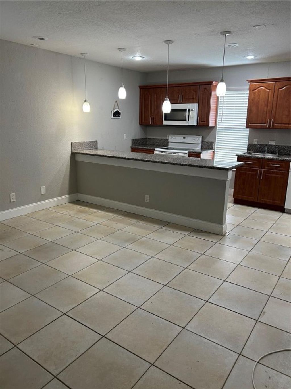 Photo of 3038 Coral Ridge Drive, Coral Springs, FL 33065 (MLS # F10505619)
