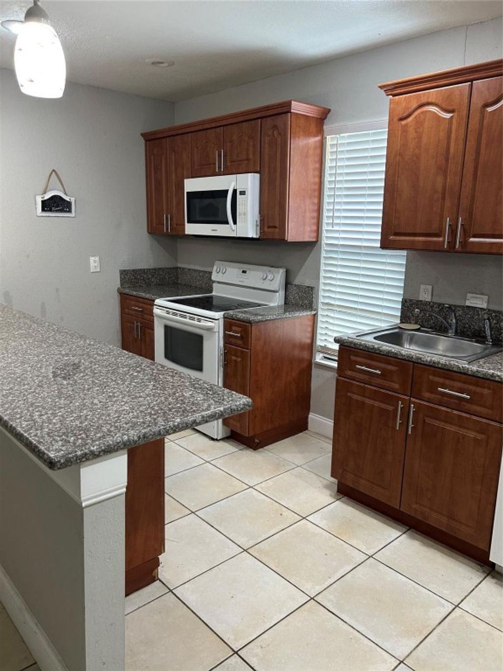 Photo of 3038 Coral Ridge Drive, Coral Springs, FL 33065 (MLS # F10505619)