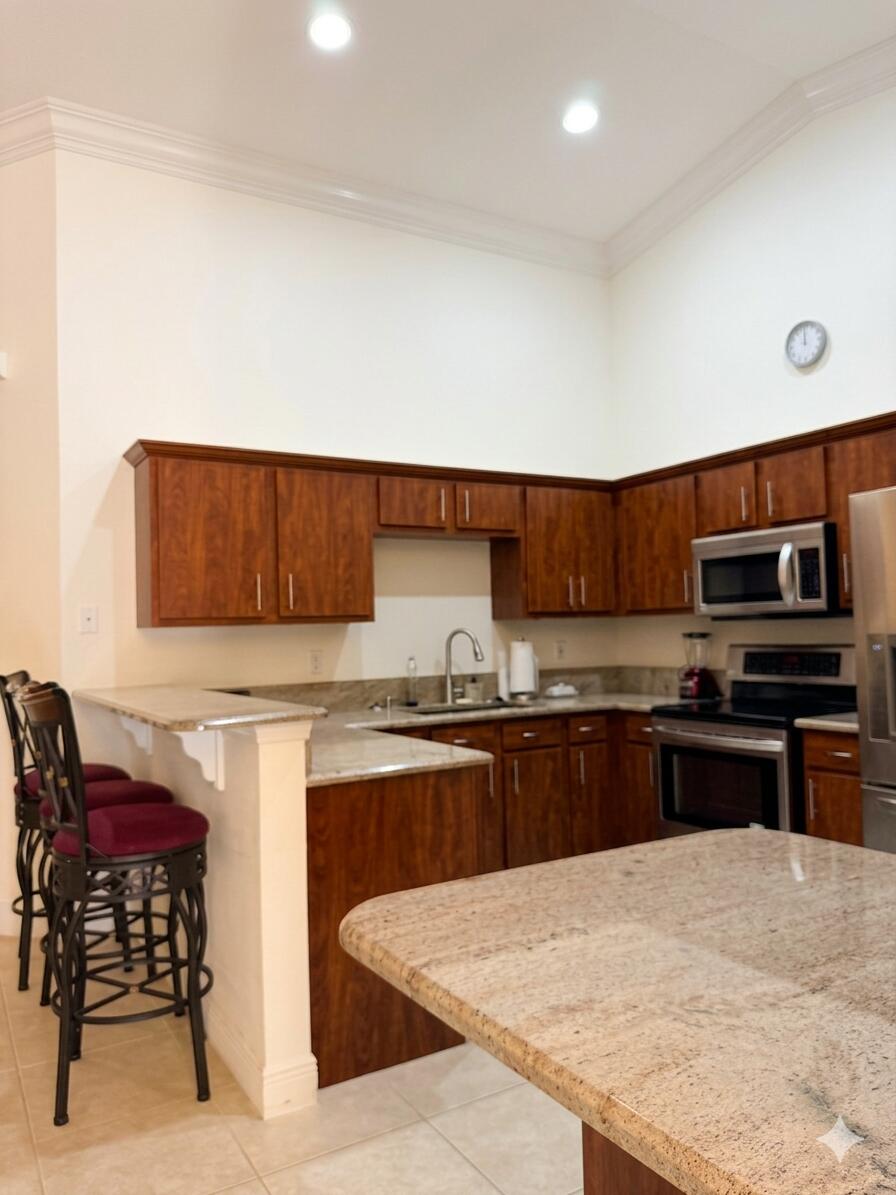 Photo of 9315 Bridgeport Drive, West Palm Beach, FL 33411 (MLS # B26028190)
