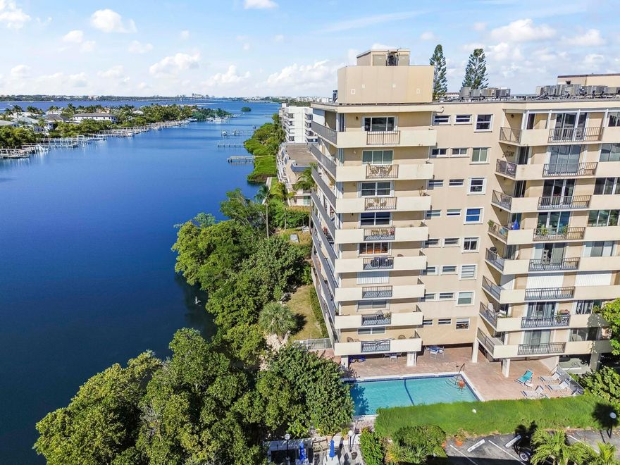 Experience the magic of South Florida living where every day concludes with a front-row seat to breathtaking sunsets. This well-maintained 2-bedroom, 2-bathroom condo offers the best of both worlds: savor peaceful, panoramic views of the Intracoastal Waterway from your private wrap-around balcony, or take a few steps across the street to your deeded beach access to watch the sunrise over the Atlantic Ocean. Whether you are catching rays by the waves or relaxing by the community pool, this residence captures the true essence of a laid-back coastal lifestyle.

Inside, the home features a beautiful kitchen designed for entertaining, complete with granite countertops, rich wood shaker cabinets, extra storage, and a dedicated wine refrigerator. Practicality meets comfort with installed hurricane shutters and a convenient trash chute on the floor. Residents enjoy a host of amenities including assigned parking, a sauna, and a large meeting room with a full kitchen for gatherings. With on-site management and HOA fees that cover basic cable, exterior maintenance, sewer, and water, this community offers a worry-free slice of paradise.