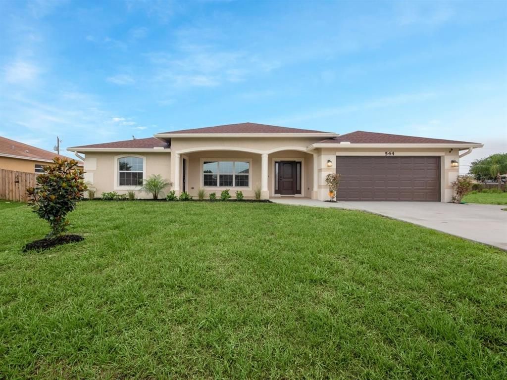 Photo of 544 SW Lakota Avenue Ave, Port St Lucie, FL 34953 (MLS # R10724906)