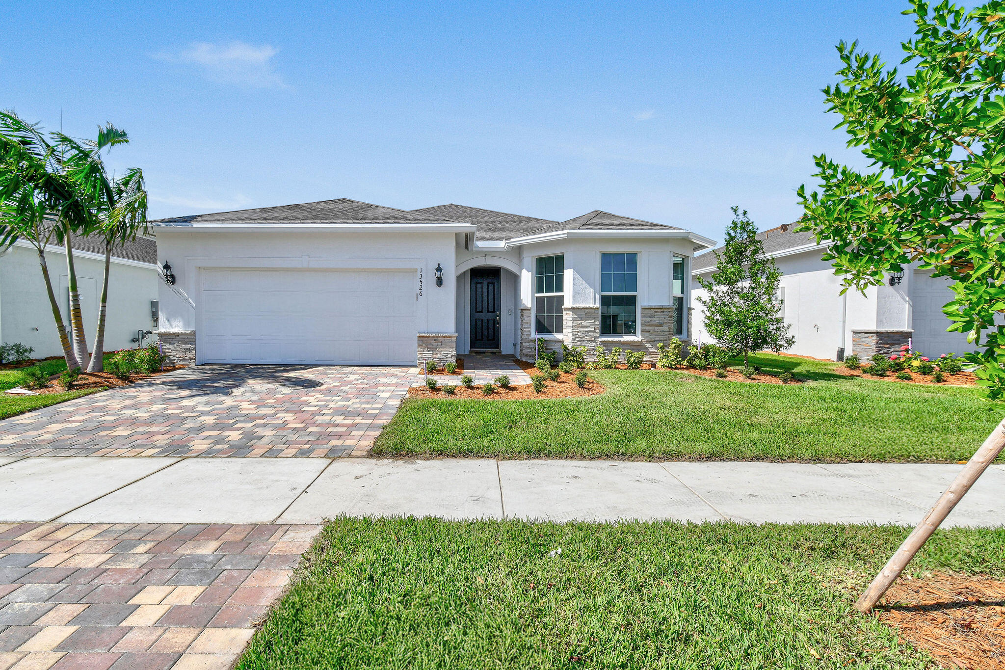 NEW CONTRUCTION: Gorgeous home with3 bedroom plus enclosed Den. Step into the spacious interior with extended gathering room and elegantly appointed Built In Kitchen. Stunning wood plank flooring seamlessly flows throughout every room. Fresh on-trend finishes adorn this gem of a home. Del Webb Tradition is in it's final phase of building. Come elevate your Active Adult lifestyle before it's too late!