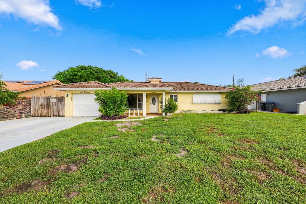 Photo of 213 NE 24th Court, Boca Raton, FL 33431 (MLS # B26088685)