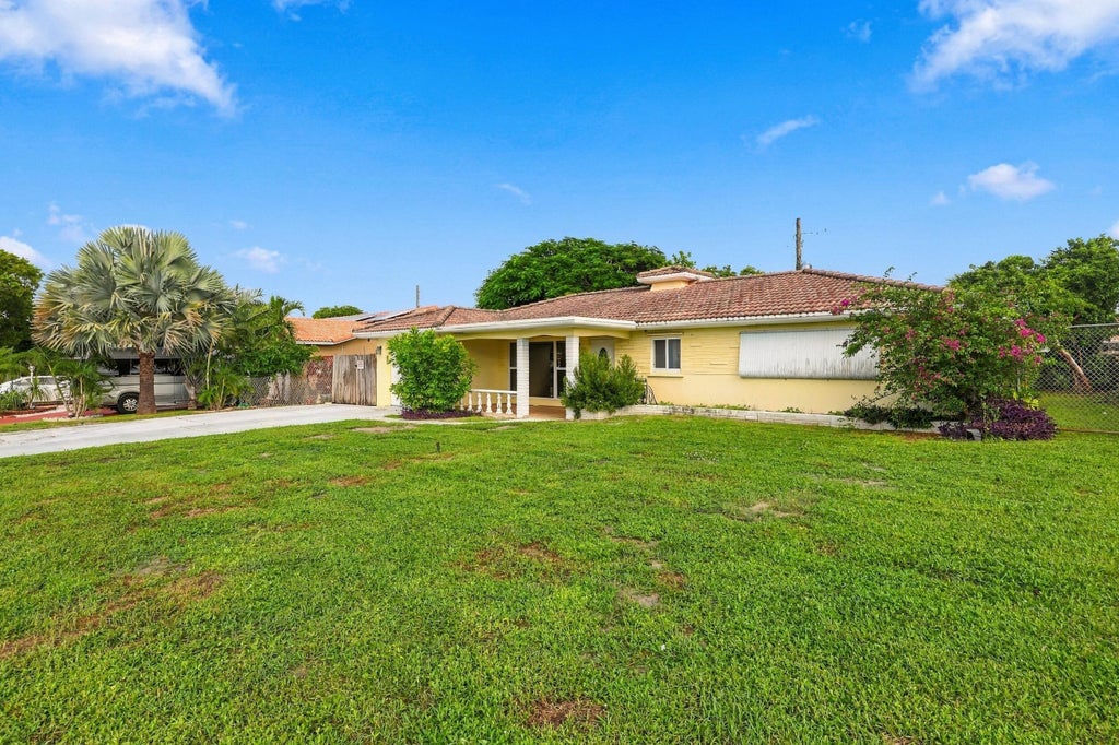 Photo of 213 NE 24th Court, Boca Raton, FL 33431 (MLS # B26088685)