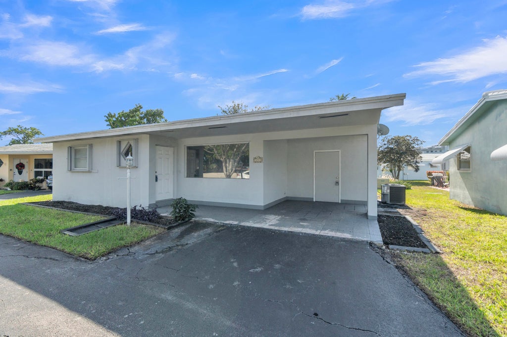 Photo of 3240 SHERIDAN Lane #117, Hollywood, FL 33021 (MLS # B26075146)