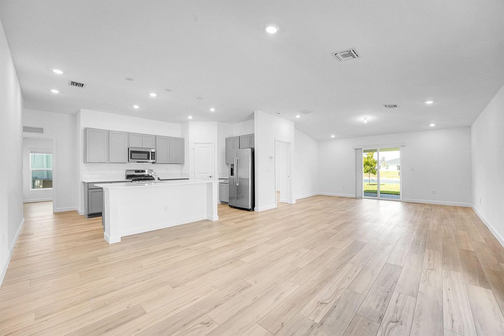 Photo of 5978 NW Pickering Drive, Port Saint Lucie, FL 34987 (MLS # R11085564)