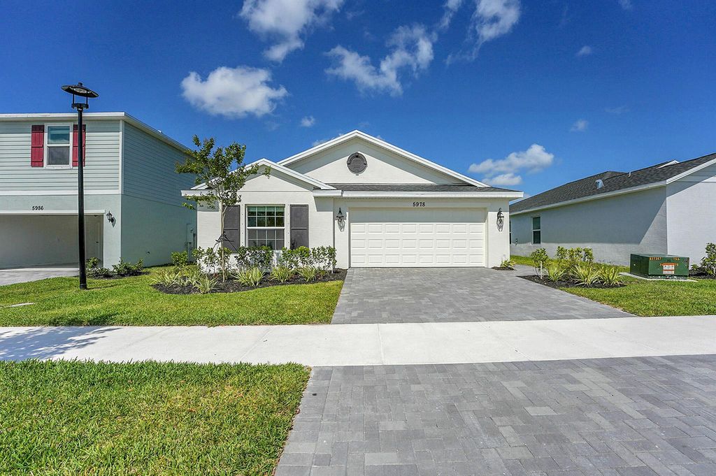 Photo of 5978 NW Pickering Drive, Port Saint Lucie, FL 34987 (MLS # R11085564)