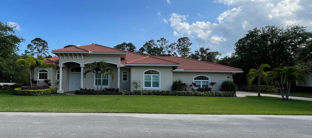 Photo of 8380 SW Cattleya Drive, Stuart, FL 34997 (MLS # R10789498)