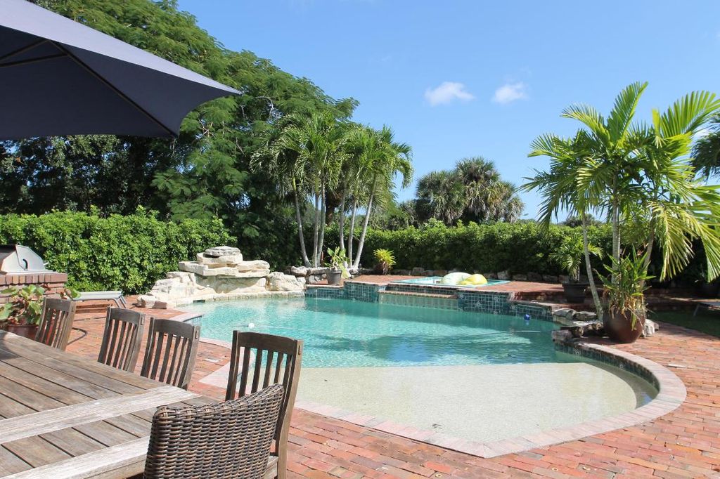 Photo of 296 Barbados Drive, Jupiter, FL 33458 (MLS # R10938206)