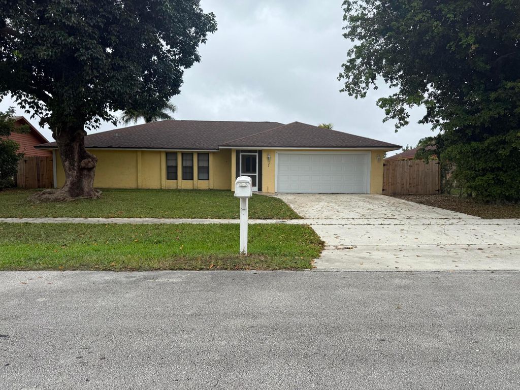 Photo of 122 Santiago Street, Royal Palm Beach, FL 33411 (MLS # B26005239)