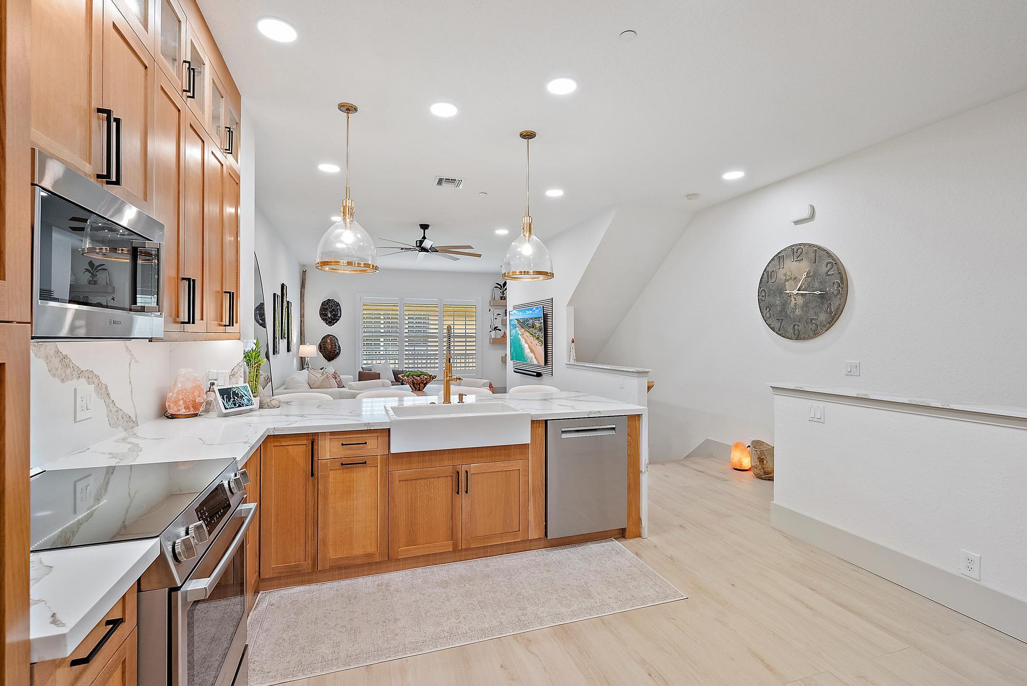 Step into a townhome like no other--where clean, contemporary elegance meets warm, inviting design. Located in the highly desirable gated community of Cielo, this meticulously upgraded 3-bedroom, 3.5-bathroom CBS-built residence spans 2,274 square feet and has been reimagined from top to bottom with the finest finishes and attention to every detail.From the moment you walk in, you'll notice the elevated design--tile flooring flows throughout, wide-plank white oak flooring on stairs, fresh paint in crisp tones brightens every room, and vaulted ceilings expand the space.