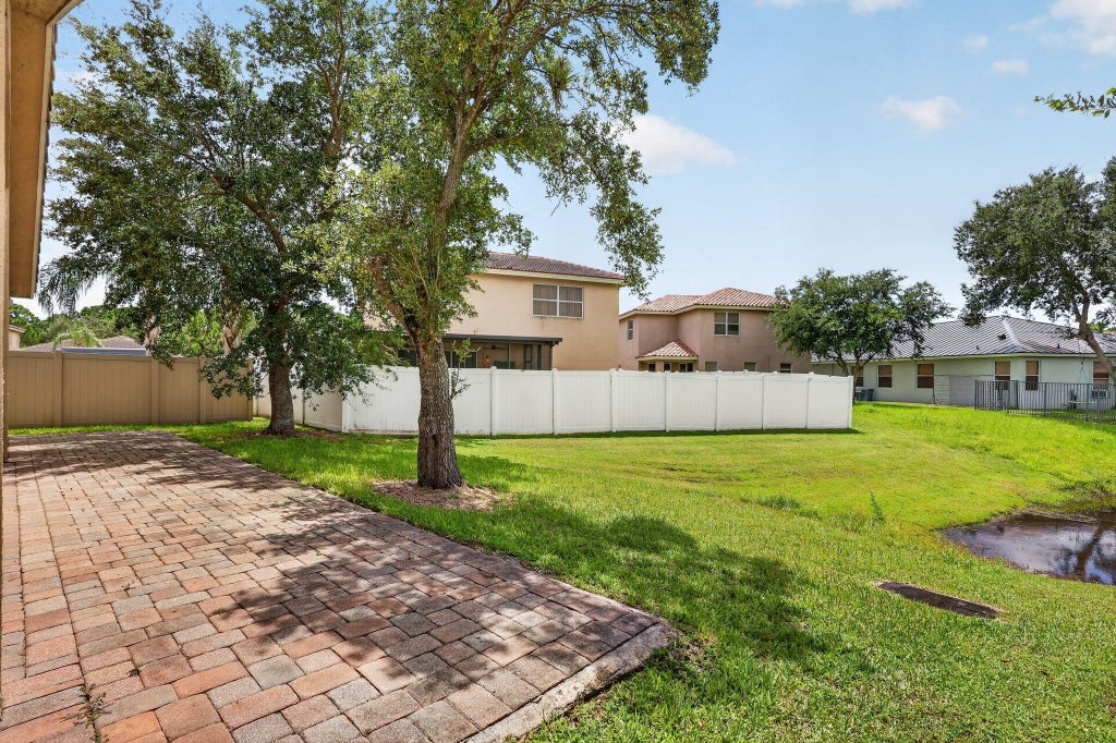 Photo of 2930 SW Chatham Lane, Port Saint Lucie, FL 34953 (MLS # B26069635)