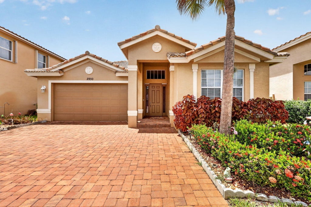 Photo of 2930 SW Chatham Lane, Port Saint Lucie, FL 34953 (MLS # B26069635)