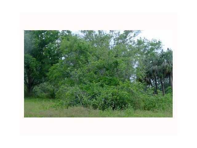 Corner lot near the dead end. Near Oak Hammock Park. Light traffic area. Easy access to I95 and the Turnpike. Great lot to build your dream home.