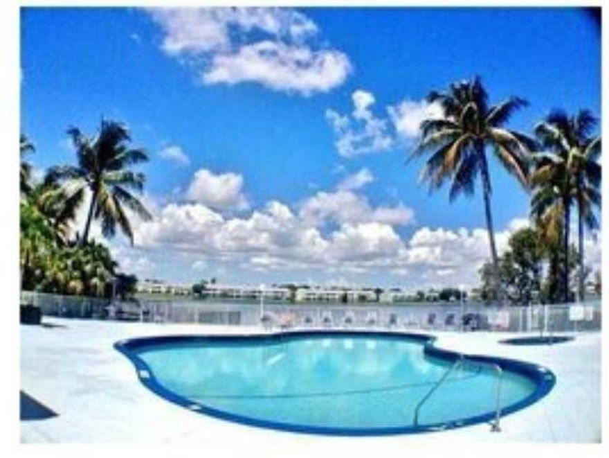 Large 2/2 with a beautiful lake view, vault ceiling updated bathroom, w/d inside and a balcony with the view of the lake.The condo has a gate, pool, spa, gym, jogging trail and it is close to I -95 and Turnpike, also very close to Chase stadium. You can rent, investor's dream! Location, Location, Location only 5 miles from Lauderdale by the sea beach a great spot in South Florida! If you want live or invest this is your place. All assessments paid.Text listing agent. Unit is occupied she paid $2000 per month until December 11/12/2025 and wants to renewal her leaseWelcomed pets any size