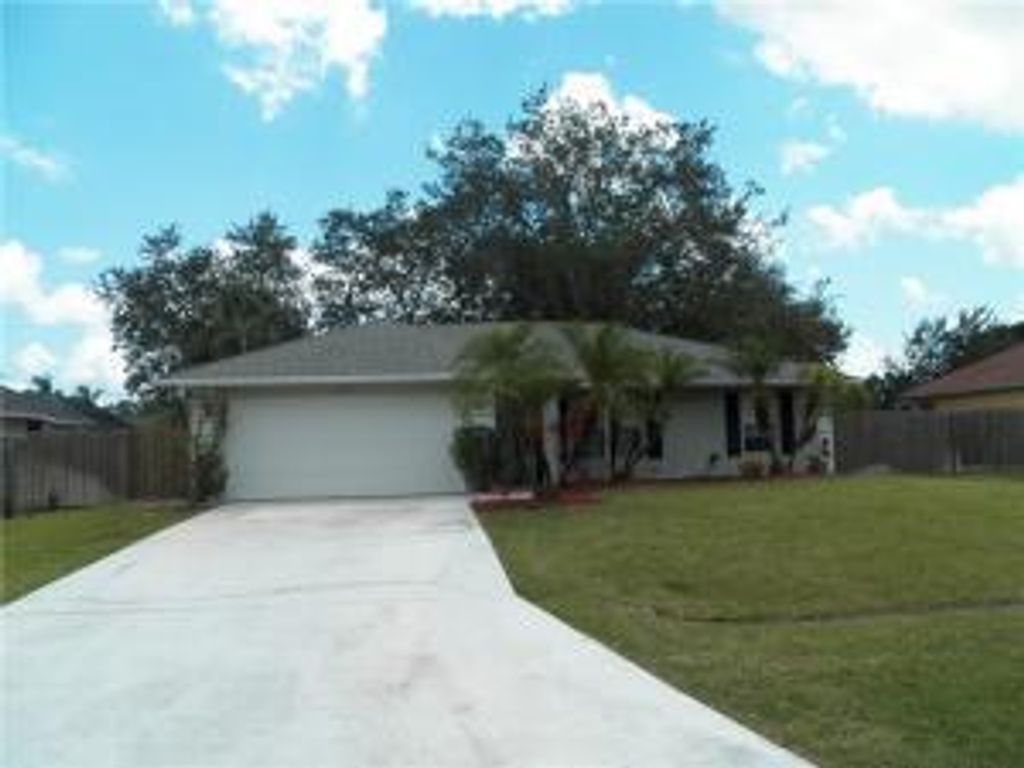 Photo of 1973 SW Cranberry Street, Port Saint Lucie, FL 34953 (MLS # R10725125)