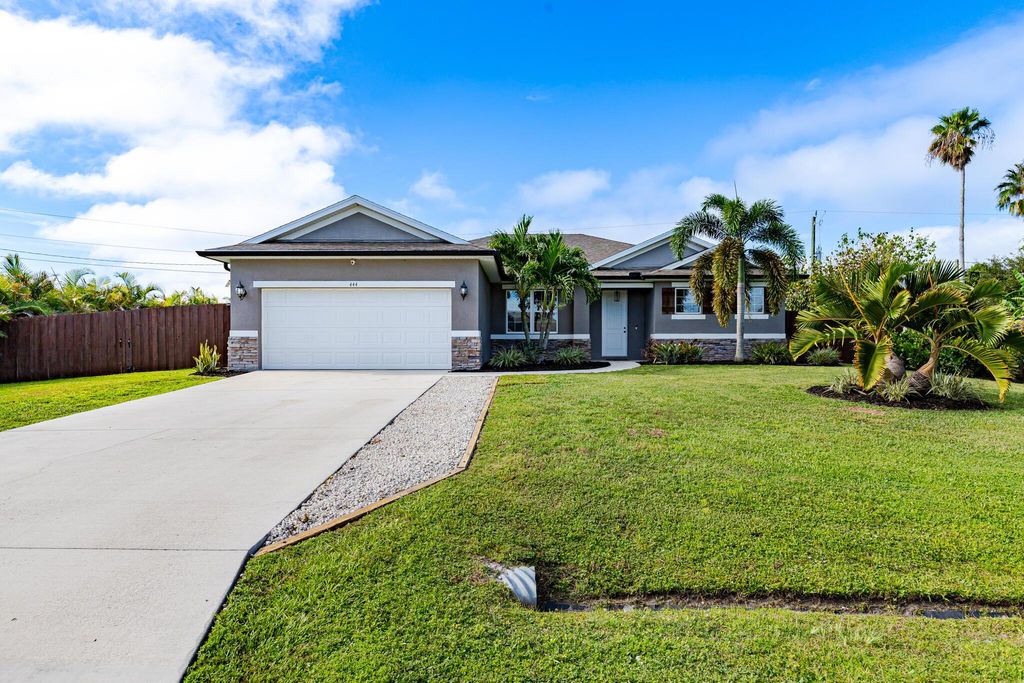 Photo of 444 SW Halibut Avenue, Port Saint Lucie, FL 34953 (MLS # R11121014)