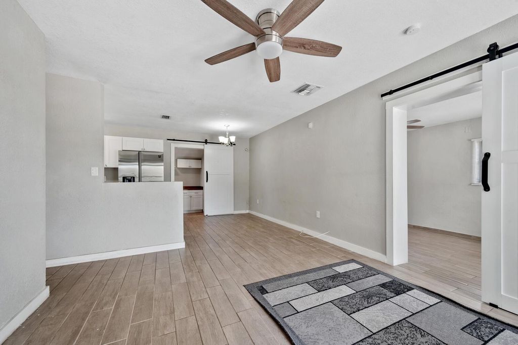 Photo of 1233 Vaughn Circle, Belle Glade, FL 33430 (MLS # R11022355)