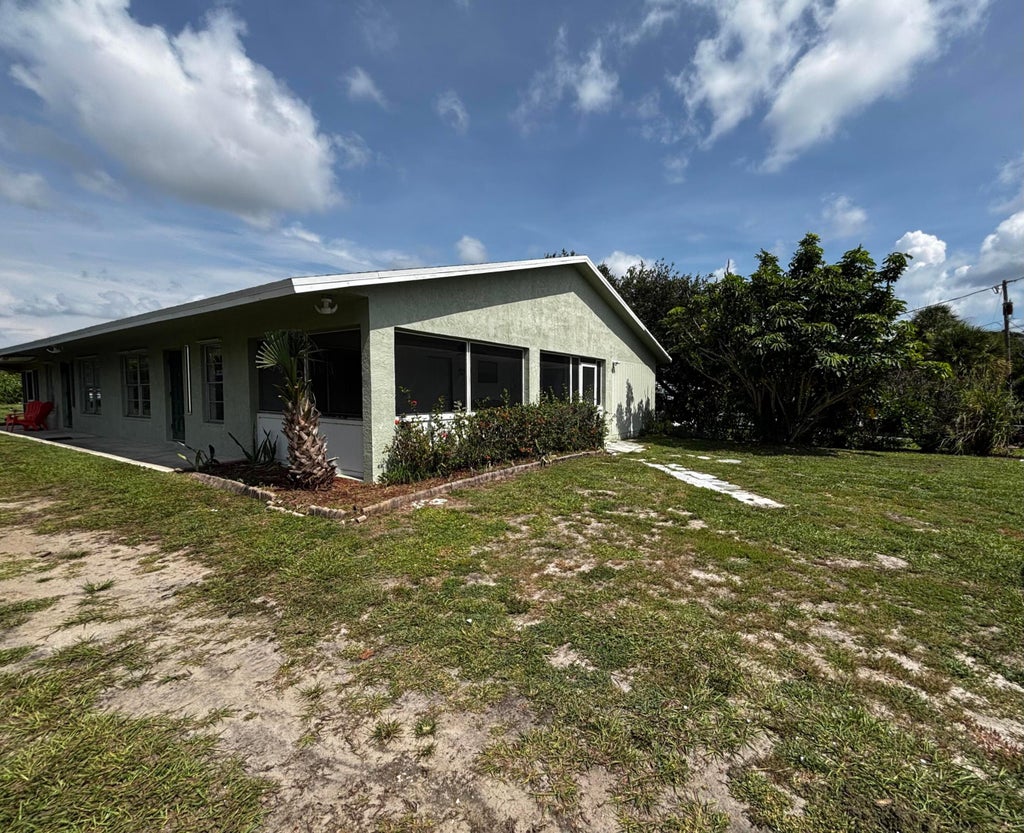 Photo of 11003 RIDGE Avenue #B, Fort Pierce, FL 34982 (MLS # B26061300)