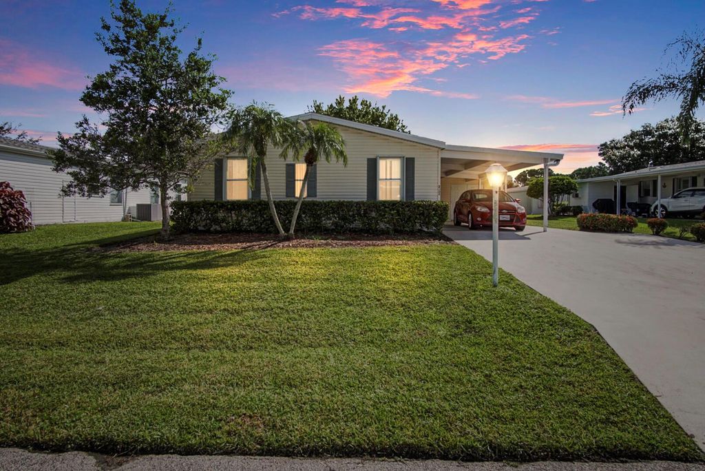 Photo of 3004 Five Iron Dr, Port Saint Lucie, FL 34952 (MLS # R11004991)