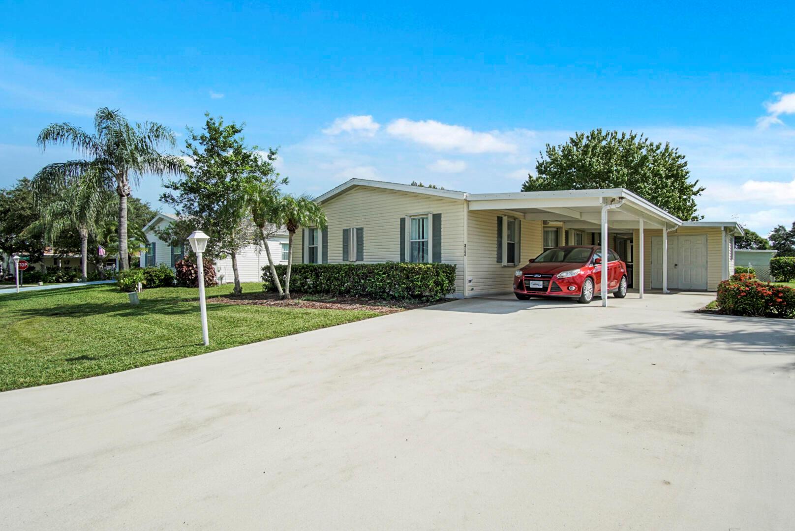 Spacious home with 2 bedrooms, 2 baths, office/den. Large open living/dining space, as well as a breakfast room off the kitchen. Kitchen features lots of cabinet space, and a screened-in porch offers additional living space to enjoy the beautiful Florida weather and for entertaining. The driveway/carport offers parking for at least 3 vehicles. Savanna Club is a lovely community with many amenities, including 3 swimming pools, clubhouse, golf, pickleball and so much more. Some TLC will make this your forever ''home sweet home''. Water, sewer, cable, and trash pickup all included in the very reasonable HOA fee.